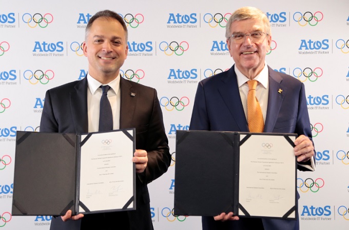 El CEO de Atos, Elie Girard, y el Presidente del COI, Thomas Bach